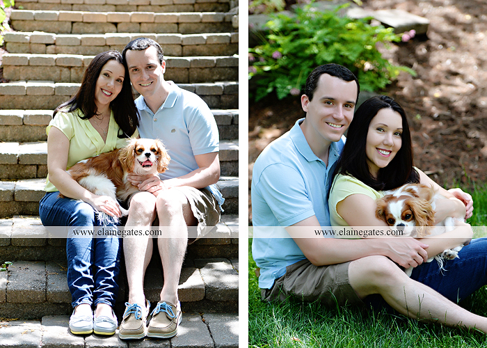 Mechanicsburg Central PA engagement portrait photographer hotel hershey outdoor steps stairs dog grass stone wall pillars hug kiss holding hands fountain water indoor balcony nr 01