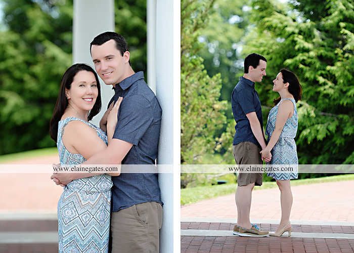 Mechanicsburg Central PA engagement portrait photographer hotel hershey outdoor steps stairs dog grass stone wall pillars hug kiss holding hands fountain water indoor balcony nr 09