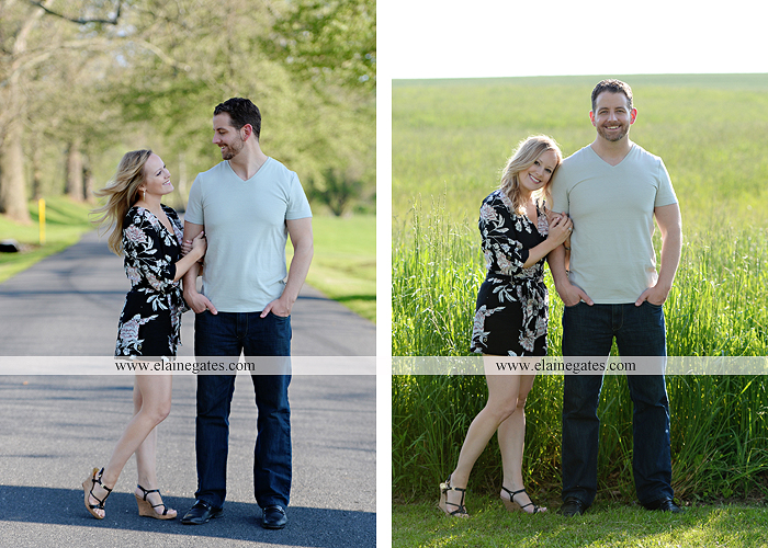 Mechanicsburg Central PA engagement portrait photographer outdoor road field trees water stream creek fence holding hands hug kiss at 2