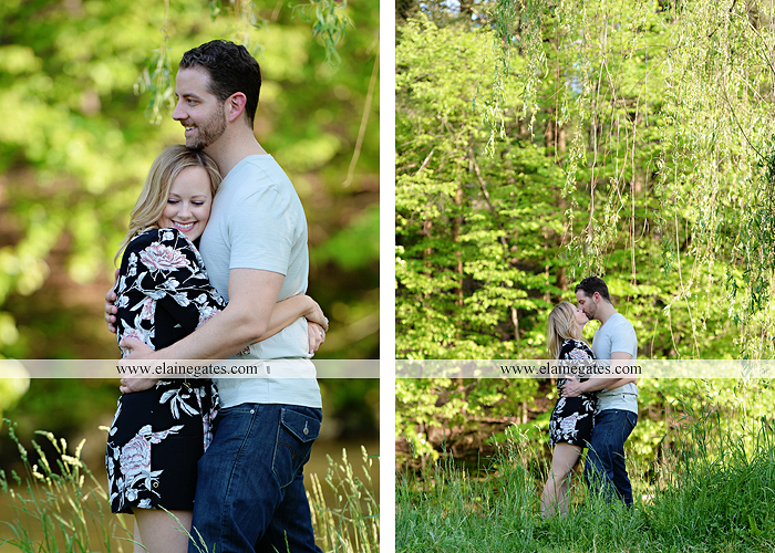 Mechanicsburg Central PA engagement portrait photographer outdoor road field trees water stream creek fence holding hands hug kiss at 4