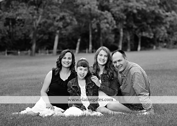 Mechanicsburg Central PA family portrait photographer outdoor children daughters sisters mother father grass trees road wheelchair hug kiss dk 04