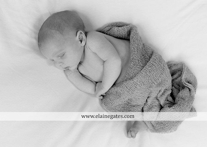 Mechanicsburg Central PA newborn baby portrait photographer boy sleeping blanket knit hat foot hand father dad mom mother kiss mb 04