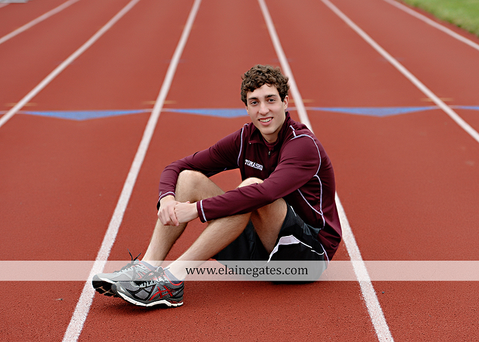 Mechanicsburg Central PA senior portrait photographer outdoor boy guy family brothers mom dad trees path field grass covered bridge messiah college track cross country running athlete at 12