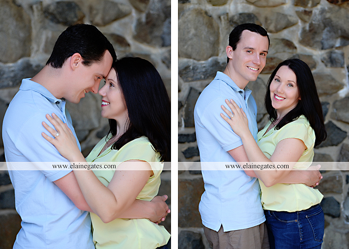 Mechanicsburg Central PA engagement portrait photographer hotel hershey outdoor steps stairs dog grass stone wall pillars hug kiss holding hands fountain water indoor balcony nr 03