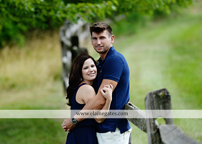 Mechanicsburg Central PA engagement portrait photographer outdoor orchard vineyard trees wildflowers fence field wood wall hug kiss holding hands mustang car aw 05