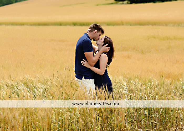 Mechanicsburg Central PA engagement portrait photographer outdoor orchard vineyard trees wildflowers fence field wood wall hug kiss holding hands mustang car aw 13