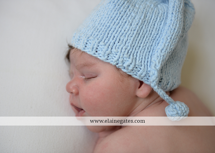 Mechanicsburg Central PA newborn baby portrait photographer boy sleeping blanket knit hat mother father son chair indoor ao 04