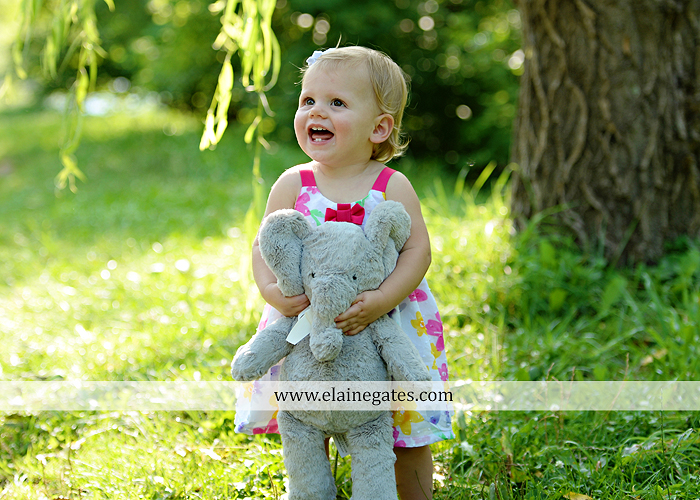 Mechanicsburg Central PA baby child portrait photographer girl outdoor family mom dad daughter road trees grass kiss stuffed animal field jt 6
