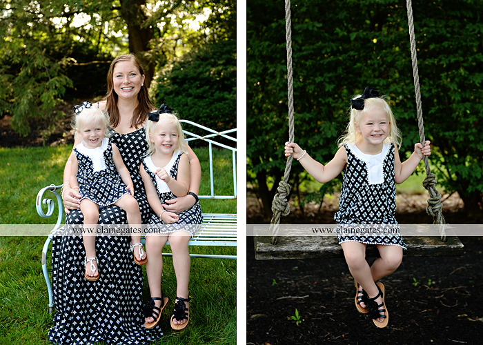mechanicsburg-central-pa-family-portrait-photographer-outdoor-father-mother-daughters-sisters-siblings-iron-bench-wooden-swing-wildflowers-grass-holding-hands-hug-kw-02