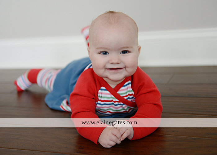 Mechanicsburg Central PA baby child portrait photographer girl indoor hardwood floor rug nursery chair mother father feet toes rb 2