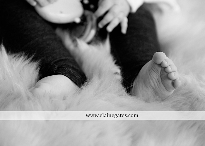 Mechanicsburg Central PA baby child portrait photographer girl indoor hardwood floor rug nursery chair mother father feet toes rb 6