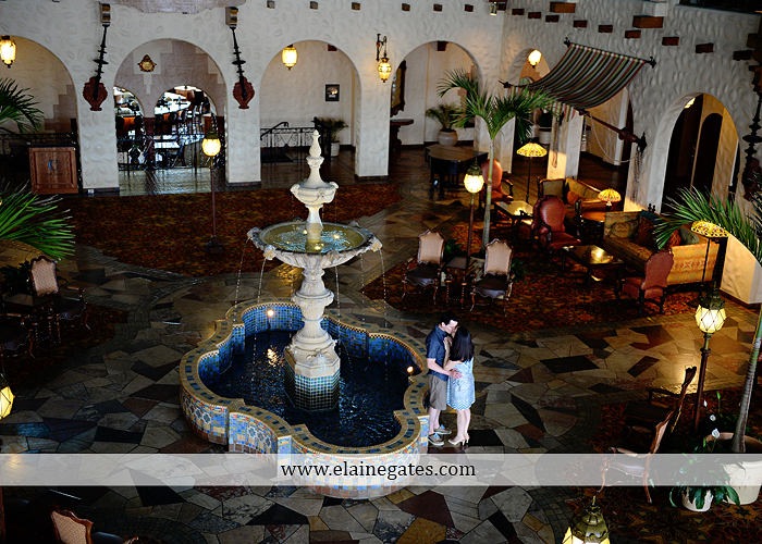 Mechanicsburg Central PA engagement portrait photographer hotel hershey outdoor steps stairs dog grass stone wall pillars hug kiss holding hands fountain water indoor balcony nr 16