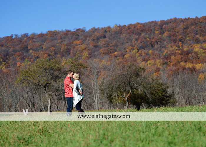 Mechanicsburg Central PA engagement portrait photographer outdoor barn fence field trees leaves dog hockey jersey baseball jersey new york yankees washington capitals bride groom mh 5