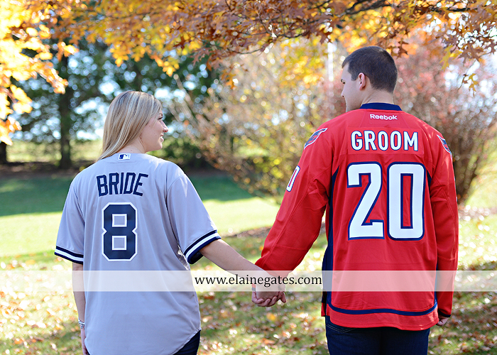 Mechanicsburg Central PA engagement portrait photographer outdoor barn fence field trees leaves dog hockey jersey baseball jersey new york yankees washington capitals bride groom mh 8