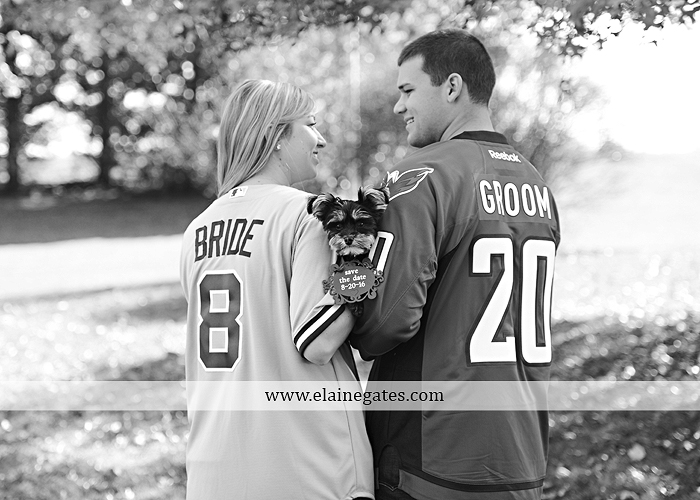 Mechanicsburg Central PA engagement portrait photographer outdoor barn fence field trees leaves dog hockey jersey baseball jersey new york yankees washington capitals bride groom mh 9