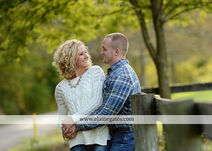 mechanicsburg-central-pa-engagement-portrait-photographer-outdoor-couple-love-hug-kiss-ring-holding-hands-road-field-hay-bale-sunset-tree-fence-water-creek-stream-shore-dog-wildflowers-ce06