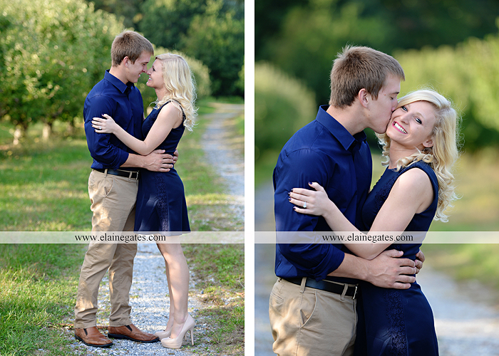 mechanicsburg-central-pa-engagement-portrait-photographer-outdoor-couple-orchard-road-path-trees-holding-hands-kiss-hug-love-barn-field-wildflowers-ls-02