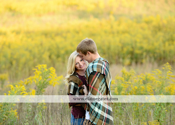 mechanicsburg-central-pa-engagement-portrait-photographer-outdoor-couple-orchard-road-path-trees-holding-hands-kiss-hug-love-barn-field-wildflowers-ls-09