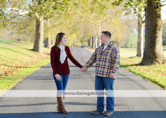Mechanicsburg Central PA engagement portrait photographer outdoor road trees leaves fence water stream creek ring fishing hook rod hay bale hug kiss kk 01