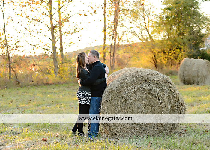 Mechanicsburg Central PA engagement portrait photographer outdoor road trees leaves fence water stream creek ring fishing hook rod hay bale hug kiss kk 09