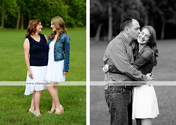 Mechanicsburg Central PA family portrait photographer outdoor children daughters sisters mother father grass trees road wheelchair hug kiss dk 01