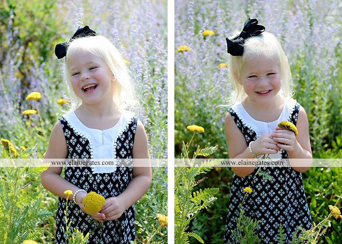 mechanicsburg-central-pa-family-portrait-photographer-outdoor-father-mother-daughters-sisters-siblings-iron-bench-wooden-swing-wildflowers-grass-holding-hands-hug-kw-04