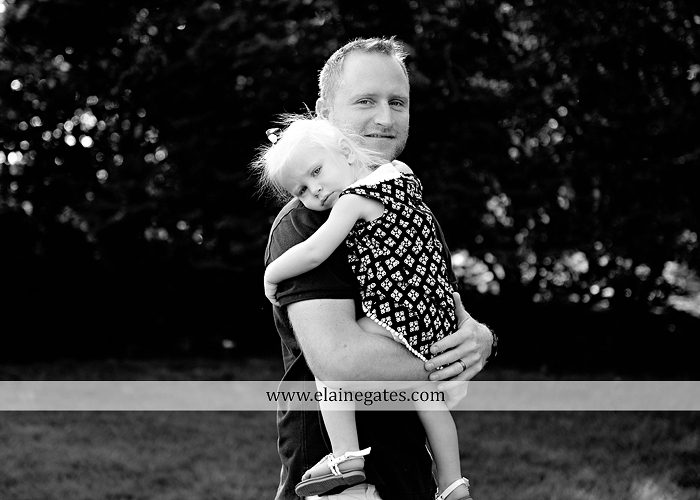 mechanicsburg-central-pa-family-portrait-photographer-outdoor-father-mother-daughters-sisters-siblings-iron-bench-wooden-swing-wildflowers-grass-holding-hands-hug-kw-09