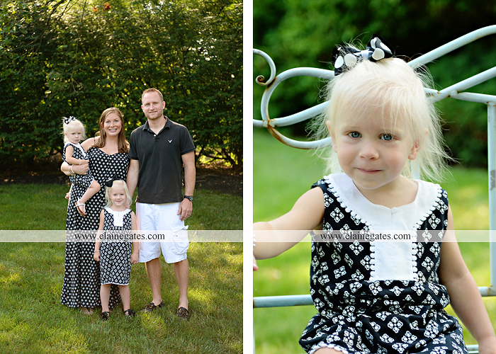 mechanicsburg-central-pa-family-portrait-photographer-outdoor-father-mother-daughters-sisters-siblings-iron-bench-wooden-swing-wildflowers-grass-holding-hands-hug-kw-10