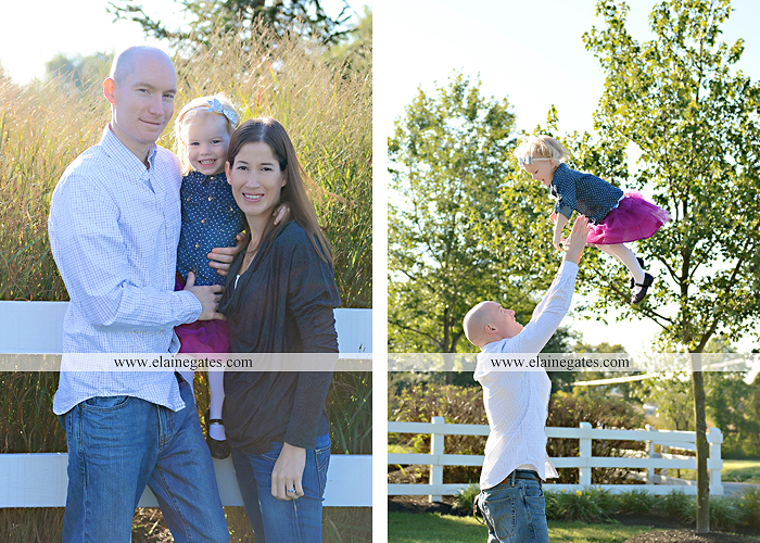 Mechanicsburg Central PA family portrait photographer outdoor girl toddler mother father sidewalk fence grass field kiss rocks az 01