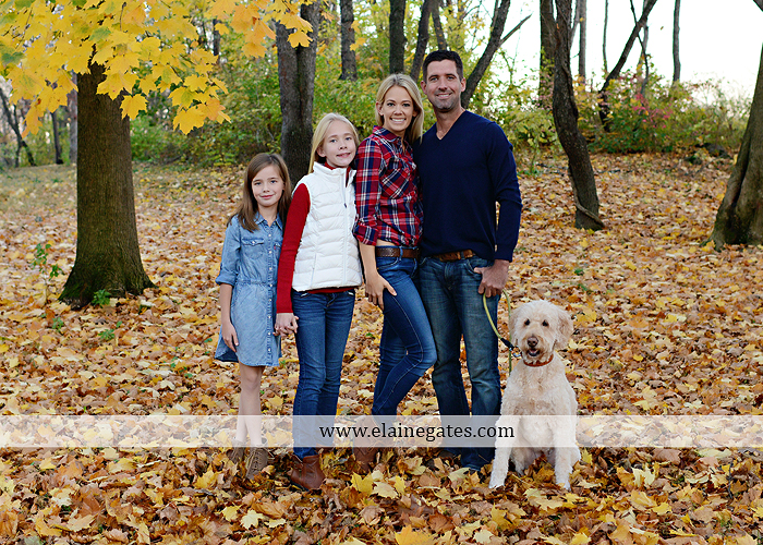 Mechanicsburg Central PA family portrait photographer outdoor girls daughters sisters dog husband wife mother father wood pile leaves trees eg 2
