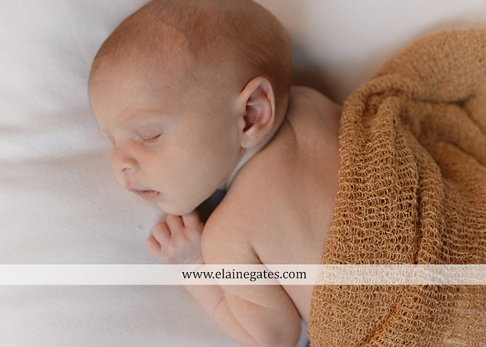 Mechanicsburg Central PA newborn baby portrait photographer boy sleeping blanket knit hat foot hand father dad mom mother kiss mb 03
