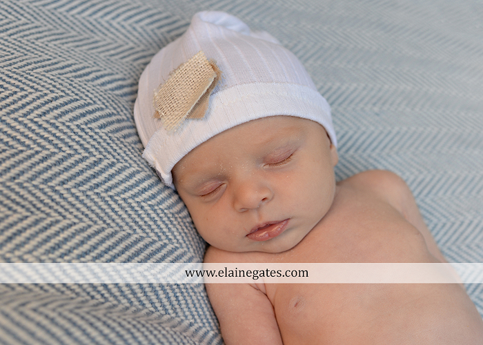 Mechanicsburg Central PA newborn baby portrait photographer boy sleeping blanket knit hat foot hand father dad mom mother kiss mb 08