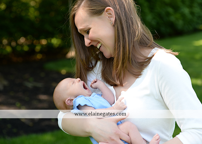 Mechanicsburg Central PA newborn baby portrait photographer boy sleeping blanket knit hat foot hand father dad mom mother kiss mb 11