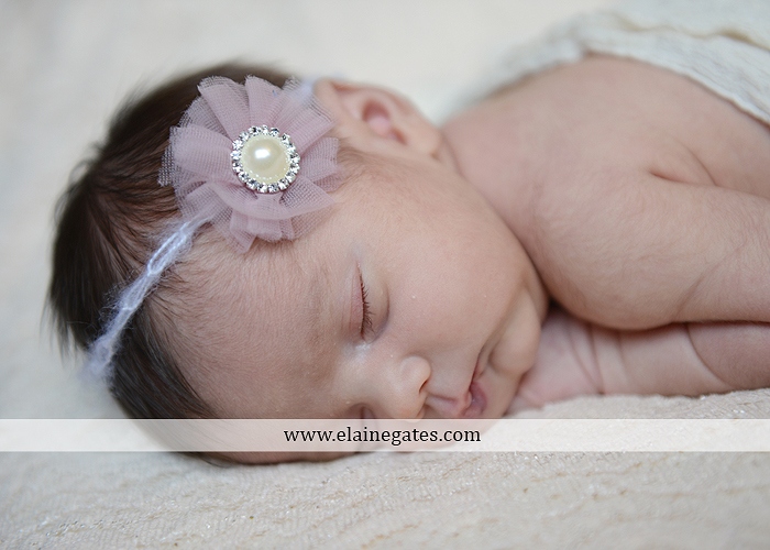 Mechanicsburg Central PA newborn baby portrait photographer girl sleeping indoor blanket sister bow hand fingers feet kiss km 3