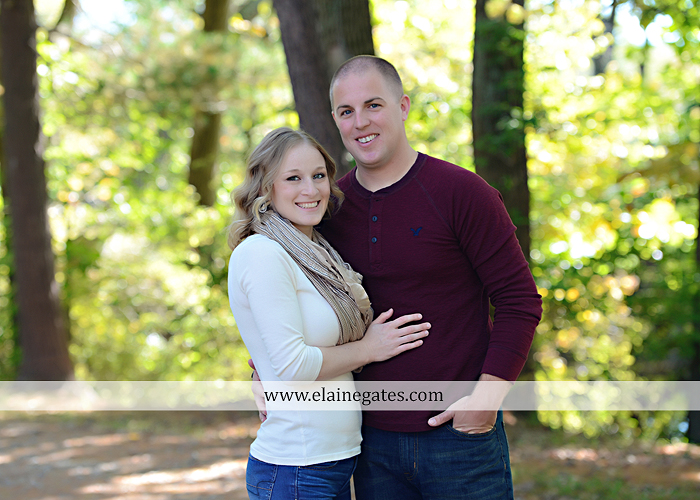Mechanicsburg Central PA portrait photographer maternity outdoor leaves water stream creek dog pumpkin covered bridge path woods trees kiss expecting mc 4