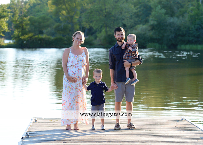 mechanicsburg-central-pa-portrait-photographer-maternity-outdoor-mother-father-sons-field-water-lake-dock-path-canoe-hug-kiss-baby-bump-nk-03