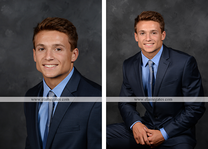 Mechanicsburg Central PA senior portrait photographer indoor guy male formal suit football player helmet jersey trinity cb 1