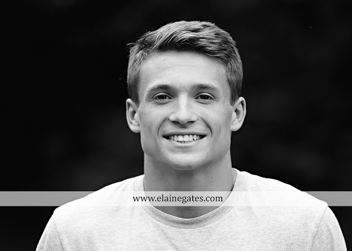 Mechanicsburg Central PA senior portrait photographer indoor guy male formal suit football player helmet jersey trinity cb 4