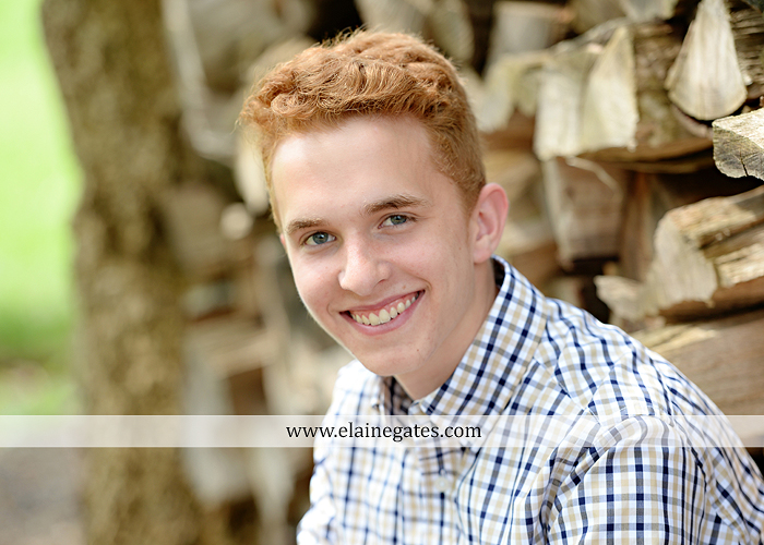 Mechanicsburg Central PA senior portrait photographer outdoor boy male formal trees woods grass wood pile forest ap 5